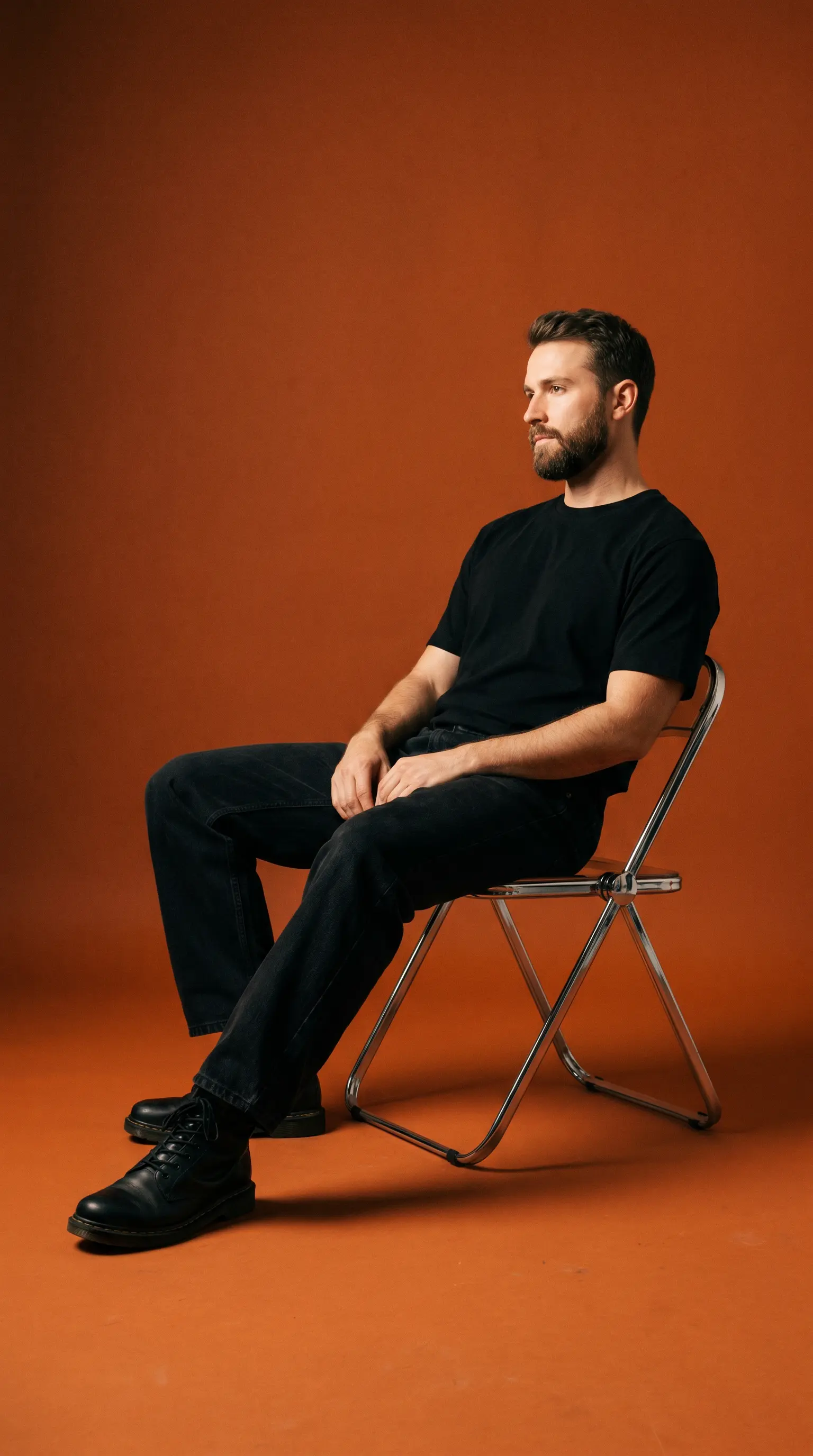 Minimalist Men's Fashion Studio Portrait in Terracotta Orange